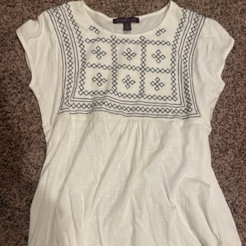 white embroidered shirt